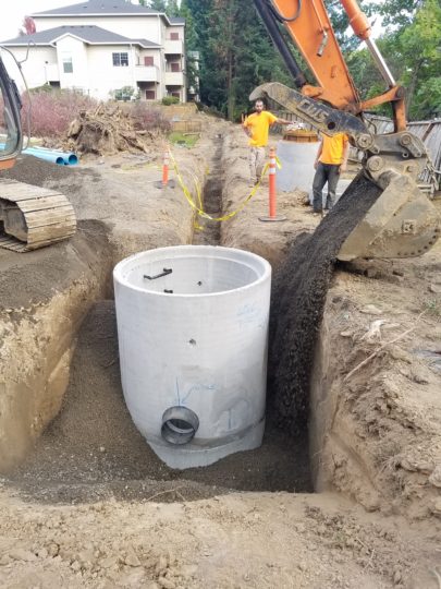 Hall-huge storm drain being backfilled